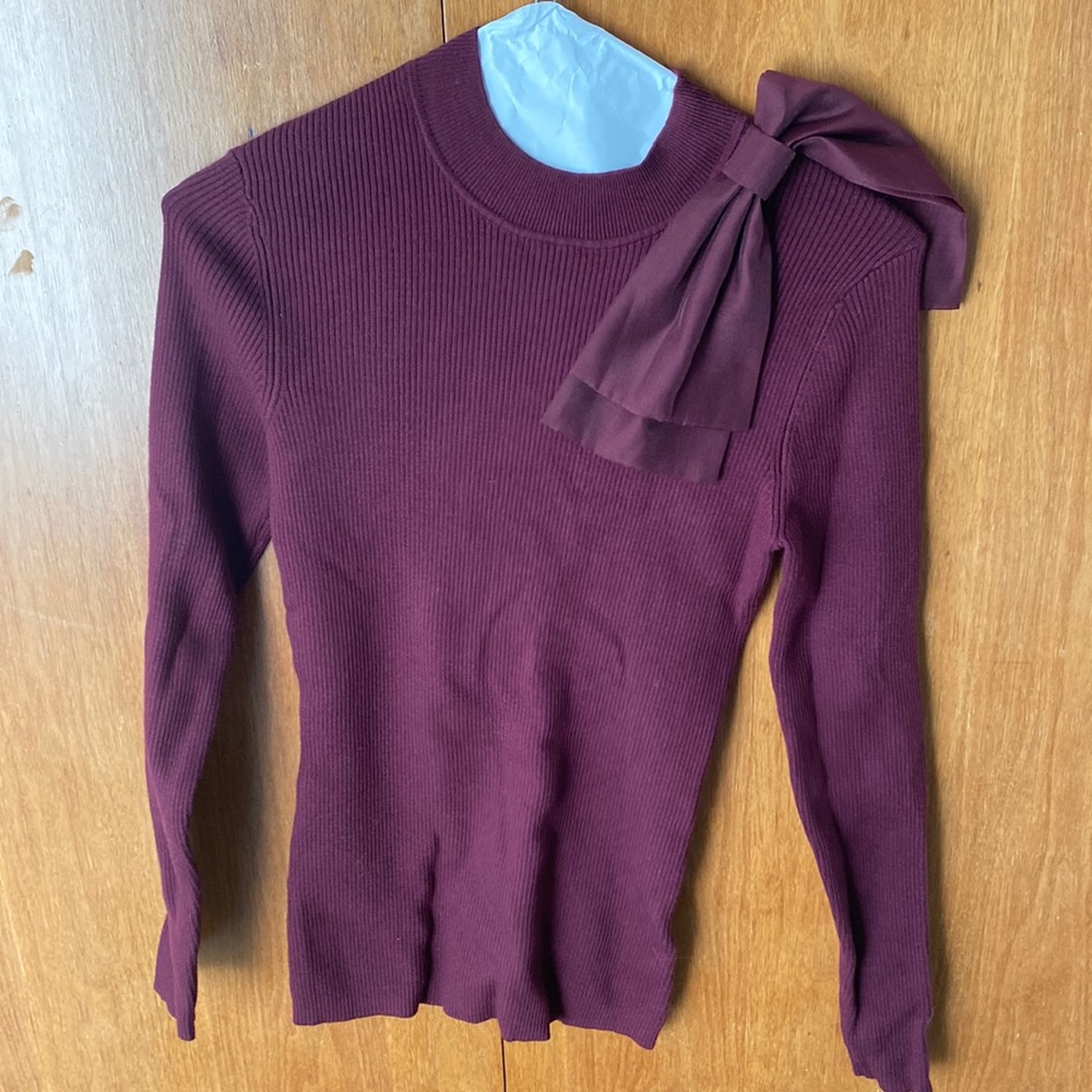 Ted Baker ribbed sweater with bow.